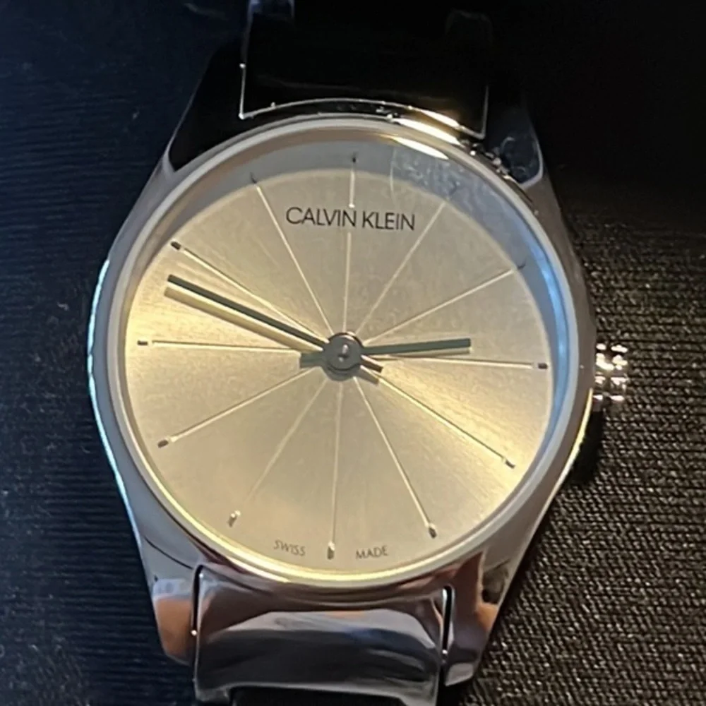 NWT Calvin Klein Swiss made women’s watch with black leather band